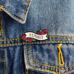 Pin's Féministe, Insigne féministe